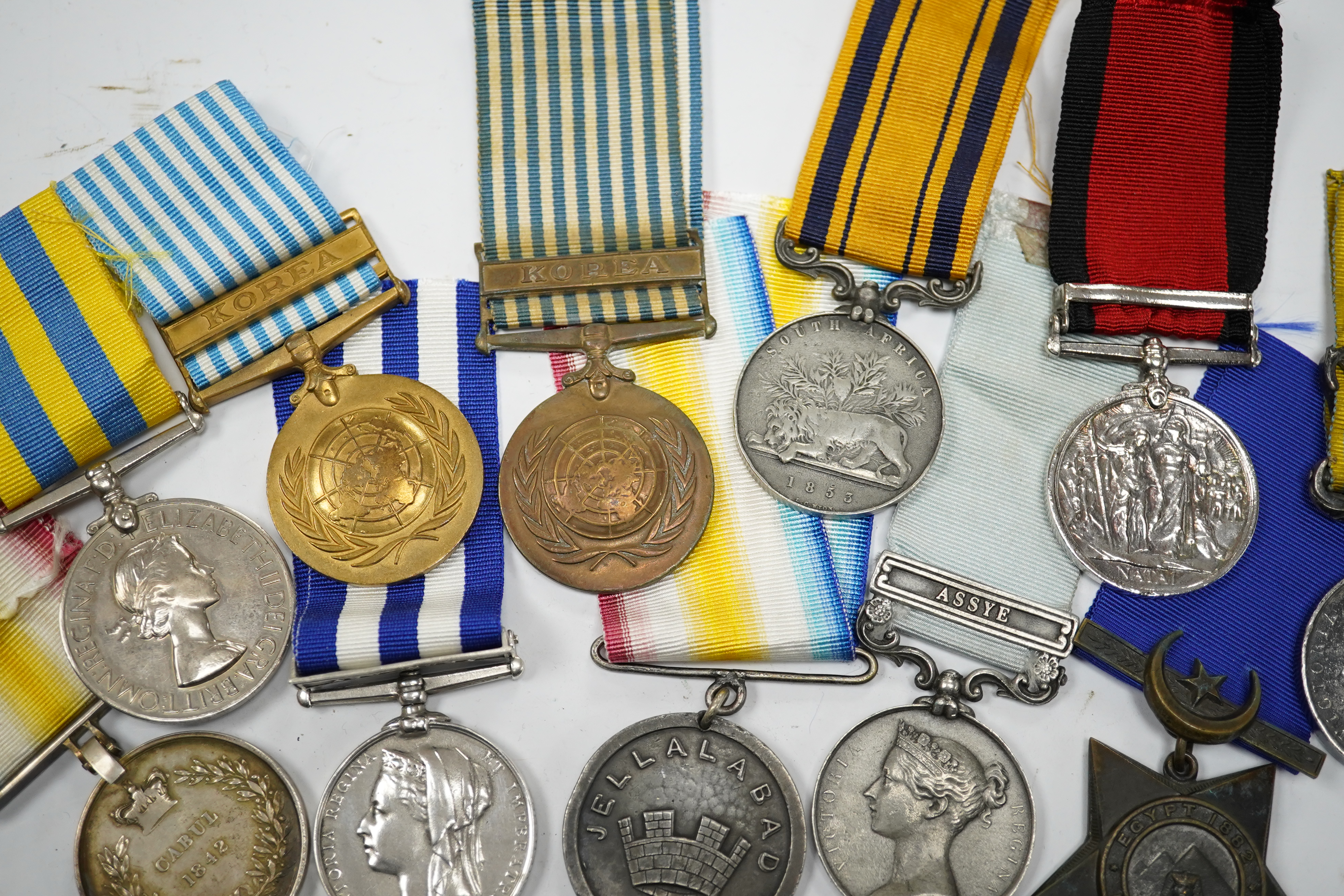 Eleven military medals, most are replica examples, etc. including